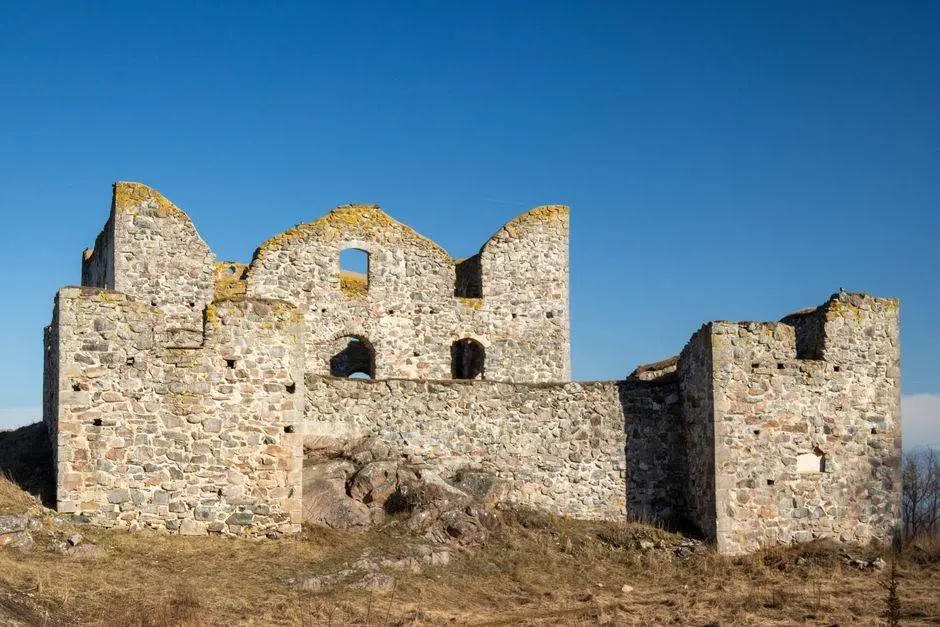 Explore historic stone ruins against a clear blue sky in Jönköping, Sweden.